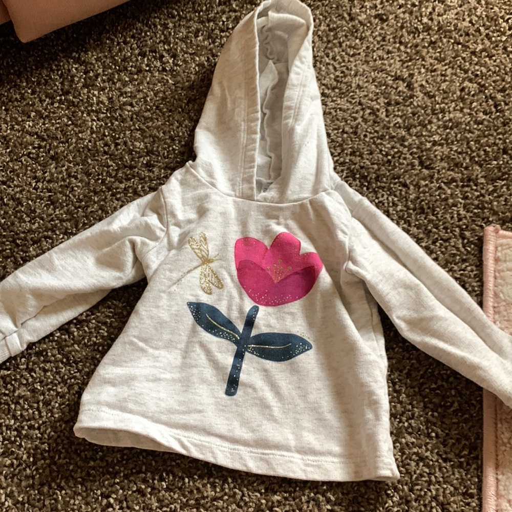 Brand New! Never been worn! Flower sweatshirt with hood!